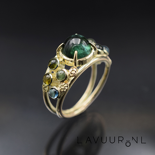 gouden ring met toermalijnen en topaas